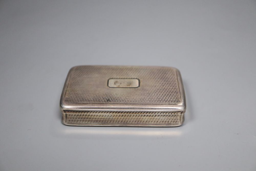 A William IV engine turned silver rectangular snuff box, Nathaniel Mills, Birmingham, 1830, 72mm (a.f.).